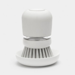 Šviesiai pilkas šepetėlis su muilo dozatoriumi Brabantia